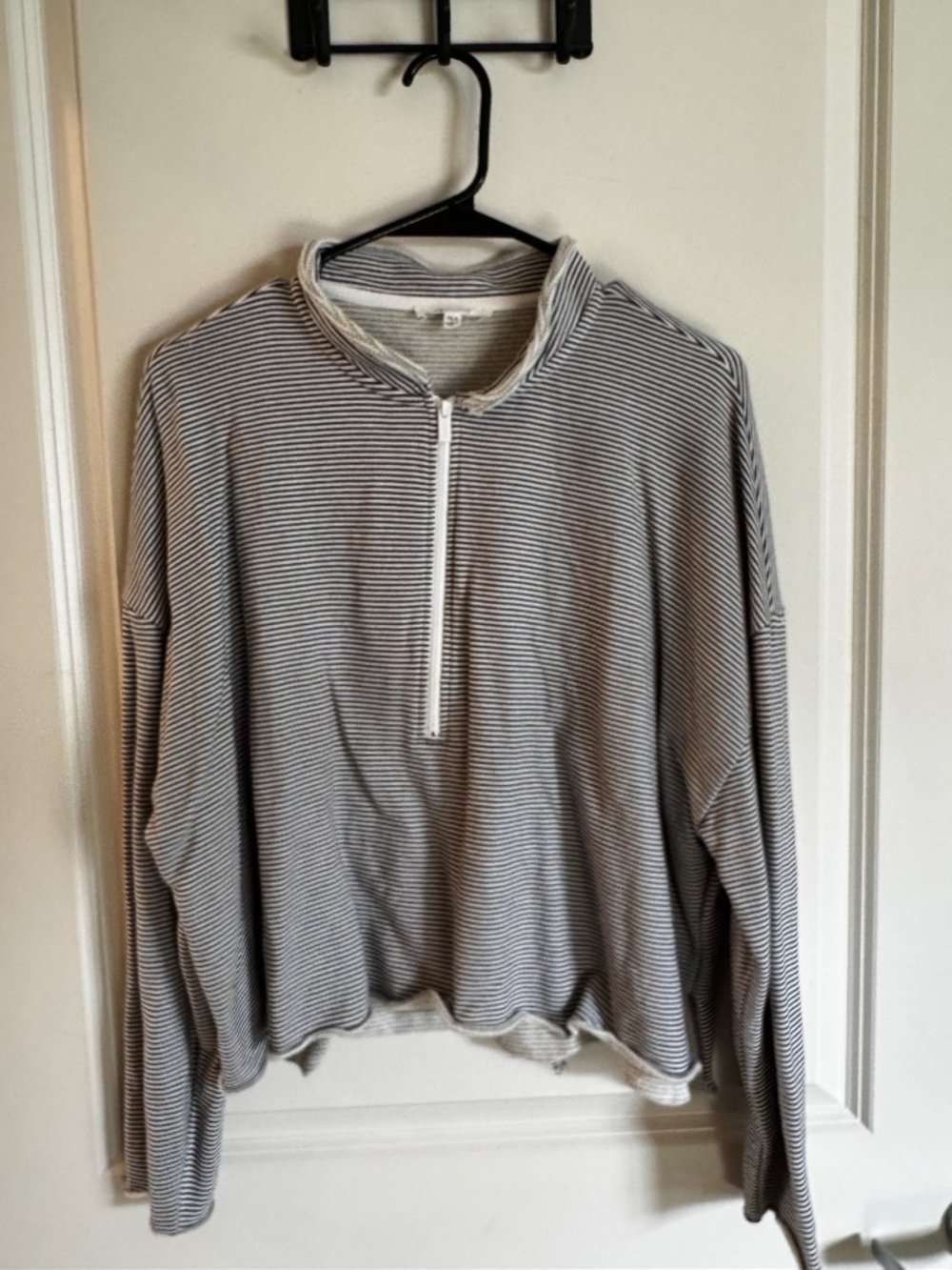 White and black stripped quarter zip